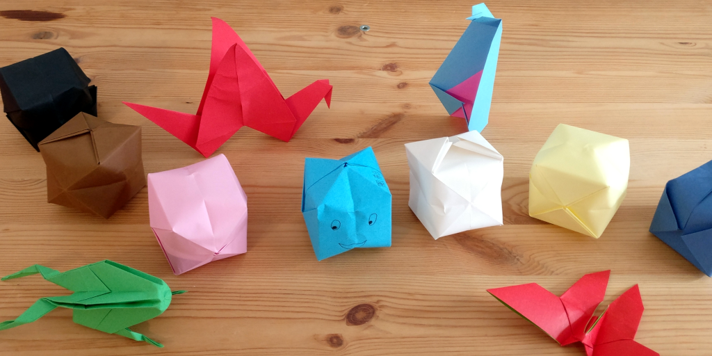 Pictures of multiple origamis boxes and animals