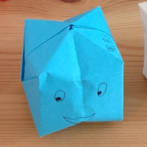 origami box in blue with eyes